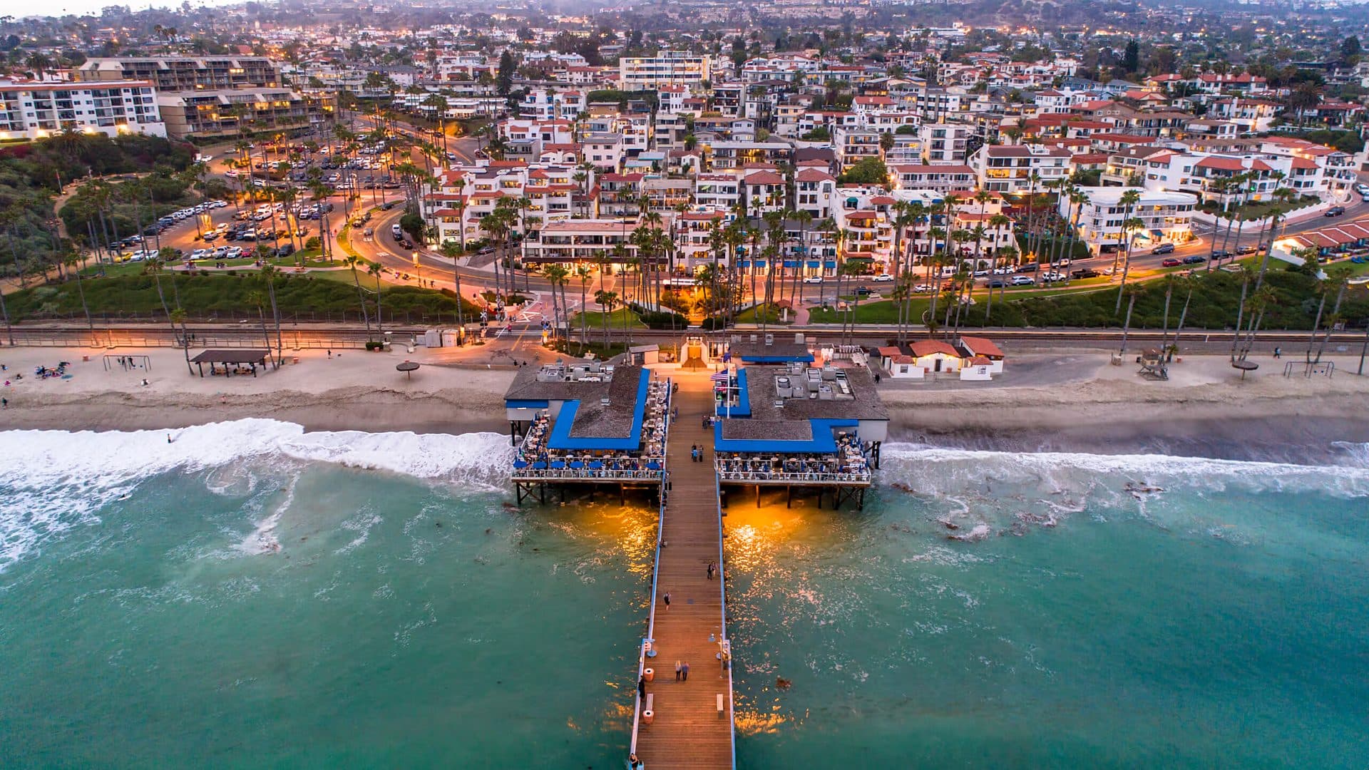 Aerial view of the San Clemente Pier and Pier Bowl at dusk